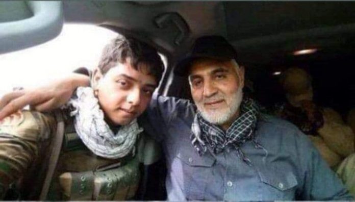 عکس لو رفته سردار سلیمانی در کنار رزمنده سوری